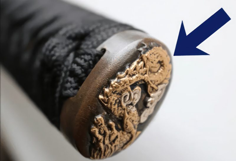 featured fittings at the end of the tsuka