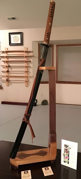 Katana Sword Displayed on a Vertical Sword Stand